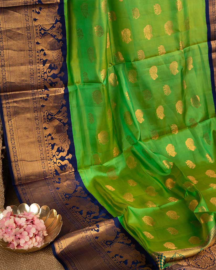 Bright Green Gadwal Silk saree with Elephant Motiff woven borders and Navy Blue Zardosi Handwork Blouse | Blouse Size 38-44” | Free Shipping
