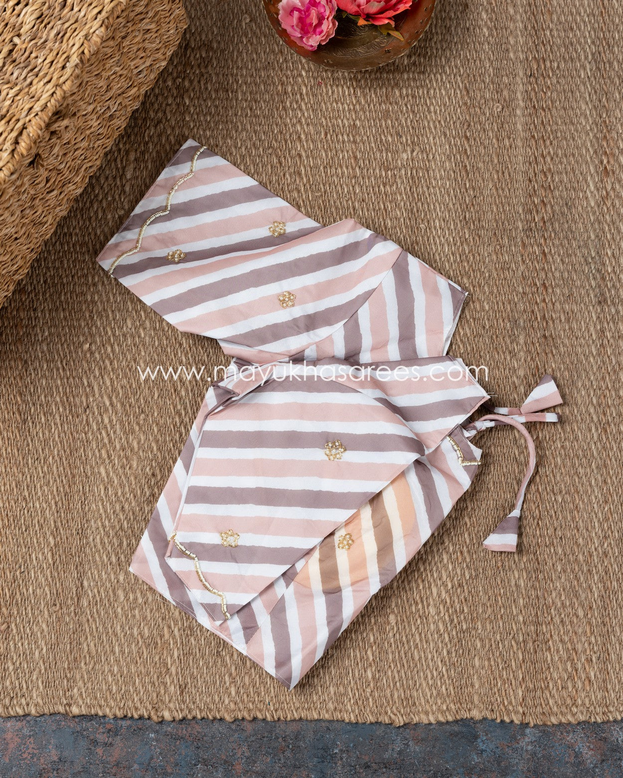 Mauve Shimmer Organza Saree With Hand Worked Borders And Beige Striped Blouse