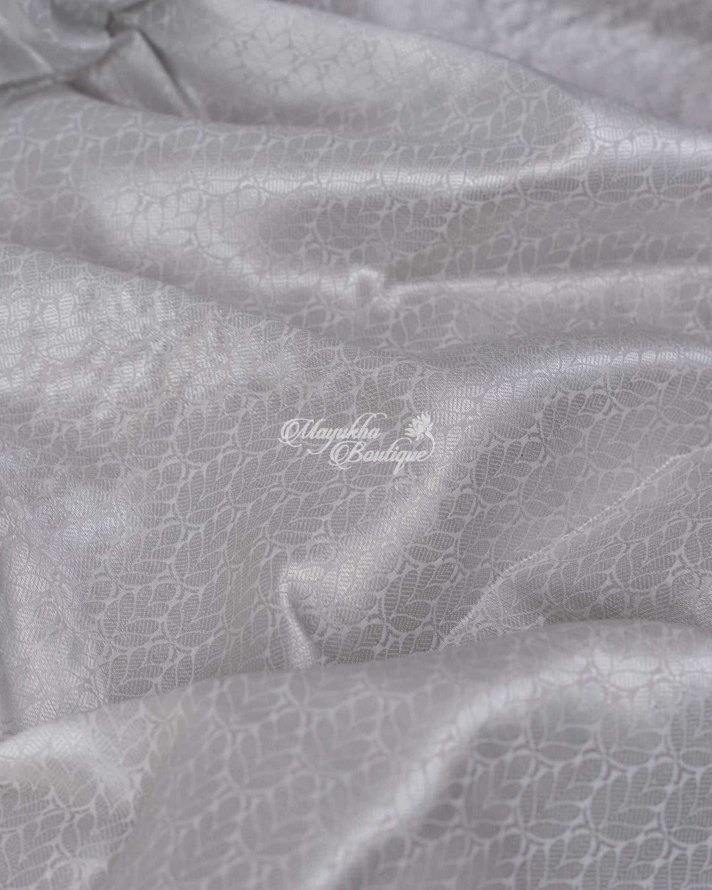 Banarasi Muslin With All Over Banarasi Weaving Silver Muslin Magnificence Saree With Stitched Blouse In Size 38-44 mayukhasarees