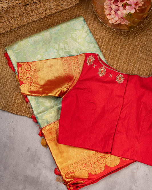 Exclusive Tissue Kanchipuram in Pastel Green with all over Parrots weaving and Red Borders & Hand Embroidered Blouse | Blouse Size 38-44” | Free Shipping