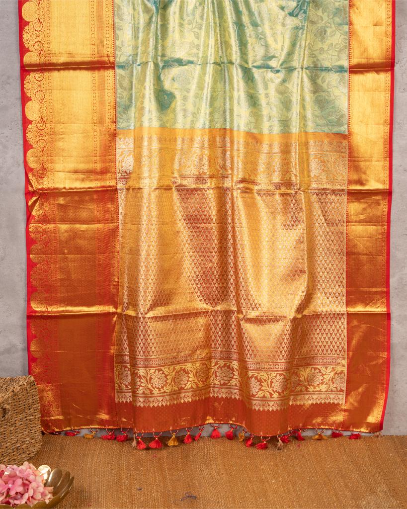Exclusive Tissue Kanchipuram in Pastel Green with all over Parrots weaving and Red Borders & Hand Embroidered Blouse | Blouse Size 38-44” | Free Shipping
