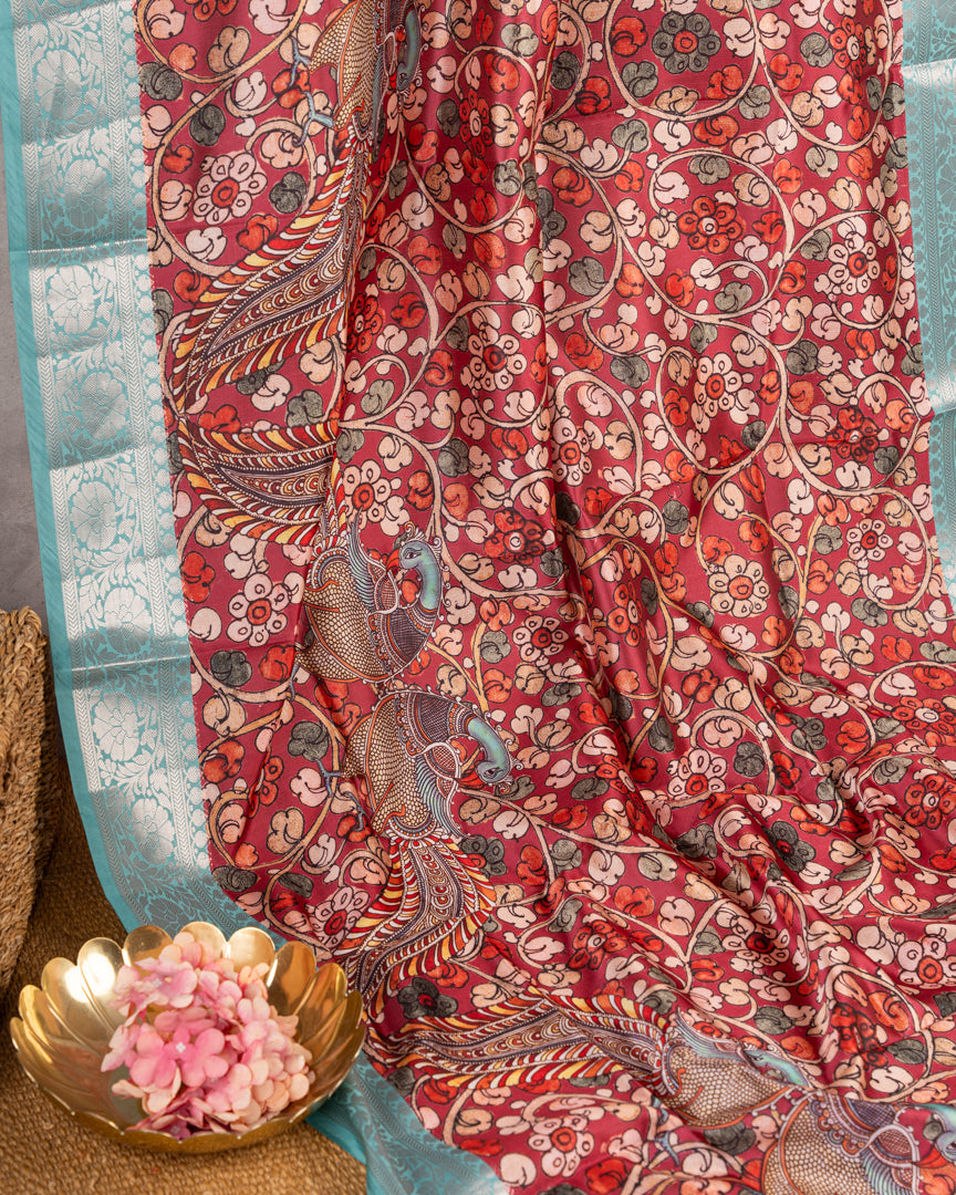 Kalamakari Prints on Maroon Dola Saree with Aqua Blue Kanchipuram Inspired Borders & Aqua Blue Kalamkari Printed Blouse