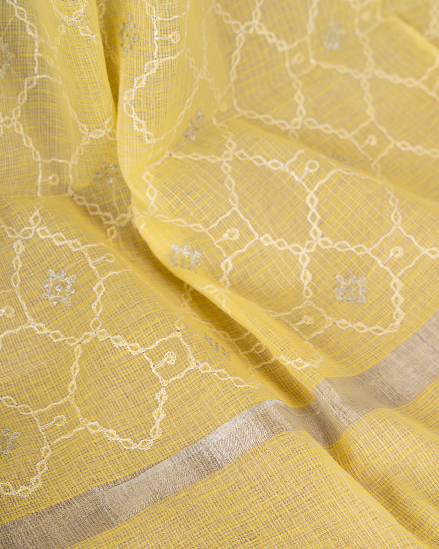 Pastel Yellow Kota Cotton Saree with machine Embroidery over the borders & Trendy Banarasi Blouse