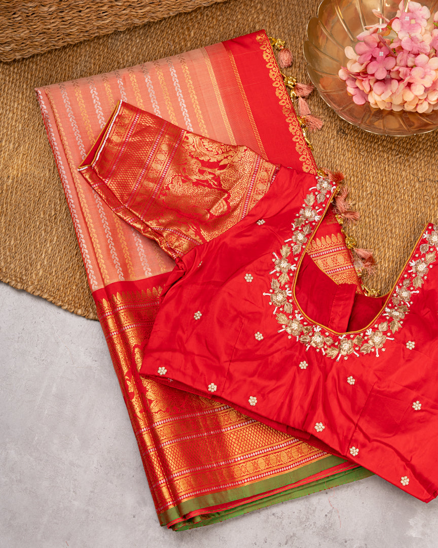Pastel Peach Gadwal Brocade Silk saree with Red Kanchipuram Inspired Borders & Red Cutdana Handwork Blouse