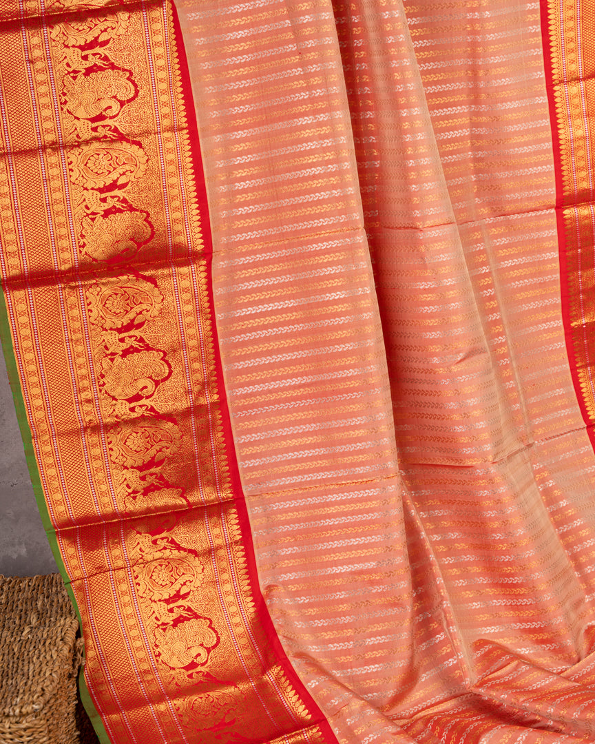 Pastel Peach Gadwal Brocade Silk saree with Red Kanchipuram Inspired Borders & Red Cutdana Handwork Blouse