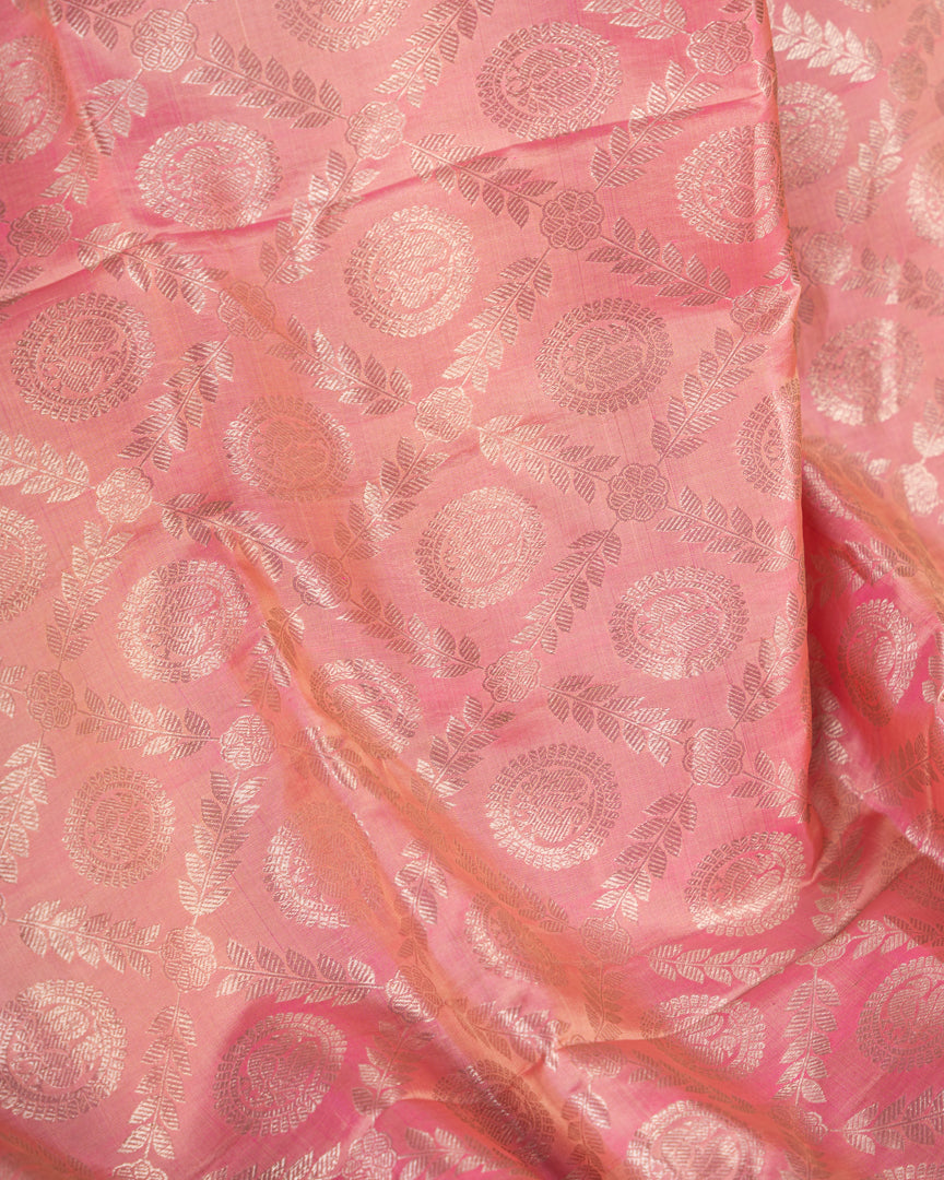 Pastel Peach Kanchipuram Silk Saree with all over Jangla Weaving and Silver borders & Elegant Hand work Purple Blouse