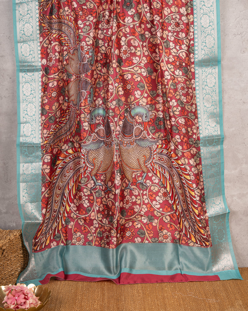 Kalamakari Prints on Maroon Dola Saree with Aqua Blue Kanchipuram Inspired Borders & Aqua Blue Kalamkari Printed Blouse