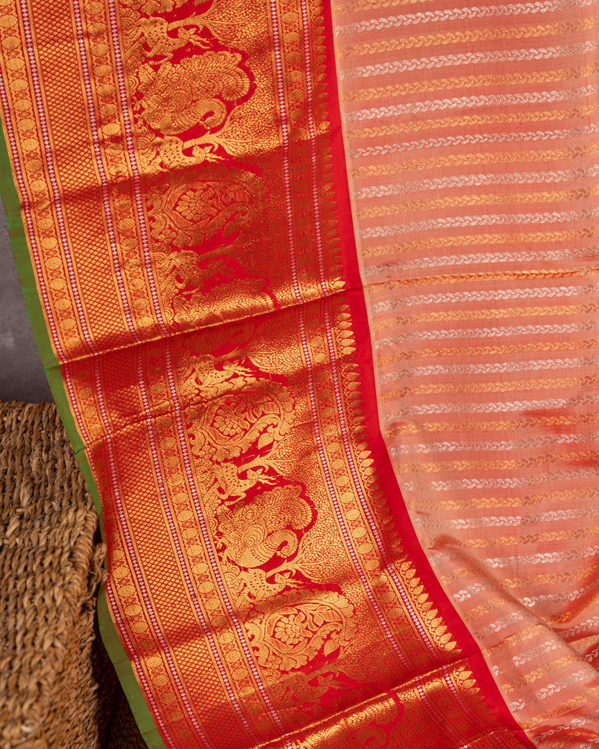 Pastel Peach Gadwal Brocade Silk saree with Red Kanchipuram Inspired Borders & Red Cutdana Handwork Blouse