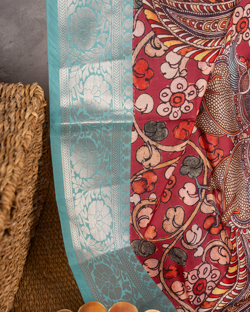 Kalamakari Prints on Maroon Dola Saree with Aqua Blue Kanchipuram Inspired Borders & Aqua Blue Kalamkari Printed Blouse