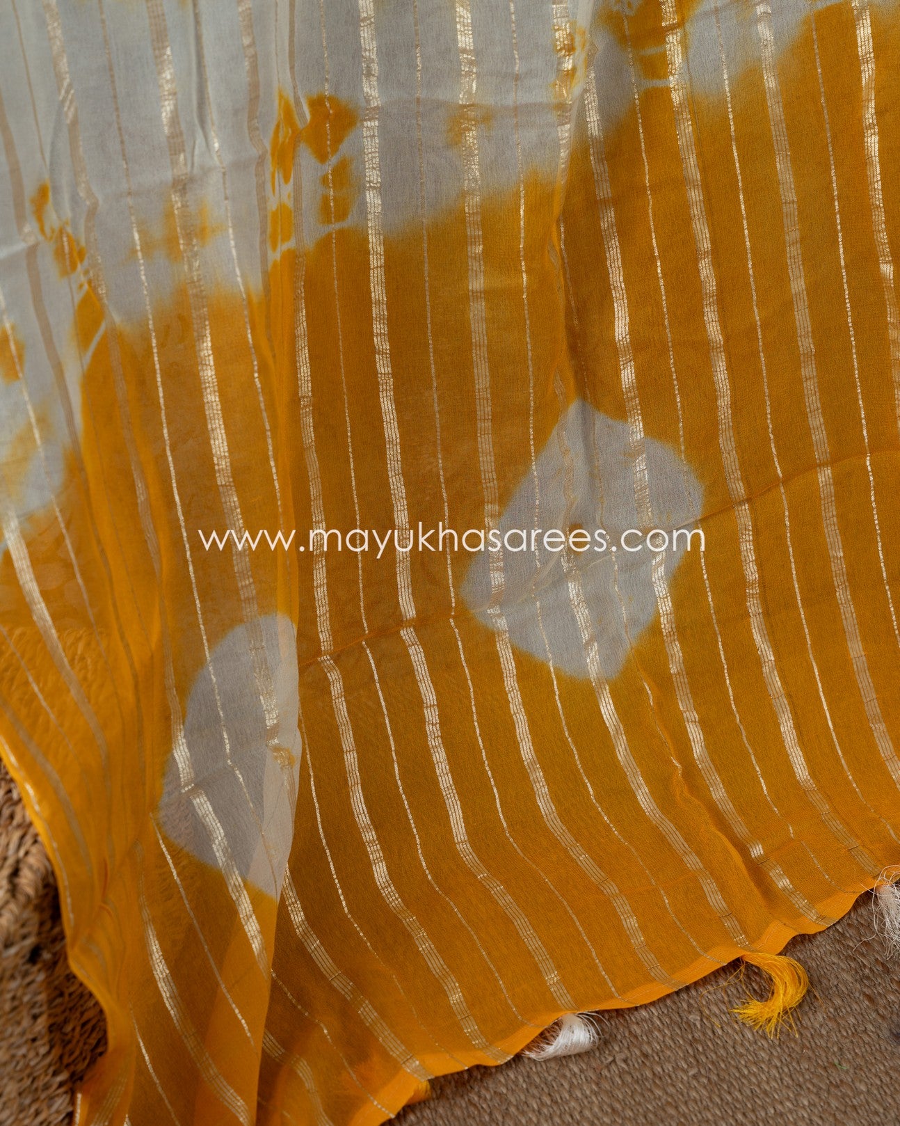 Shibori Elegance: Beige And Yellow Gorgette Saree With Stitched Custom Rawsilk Blouse