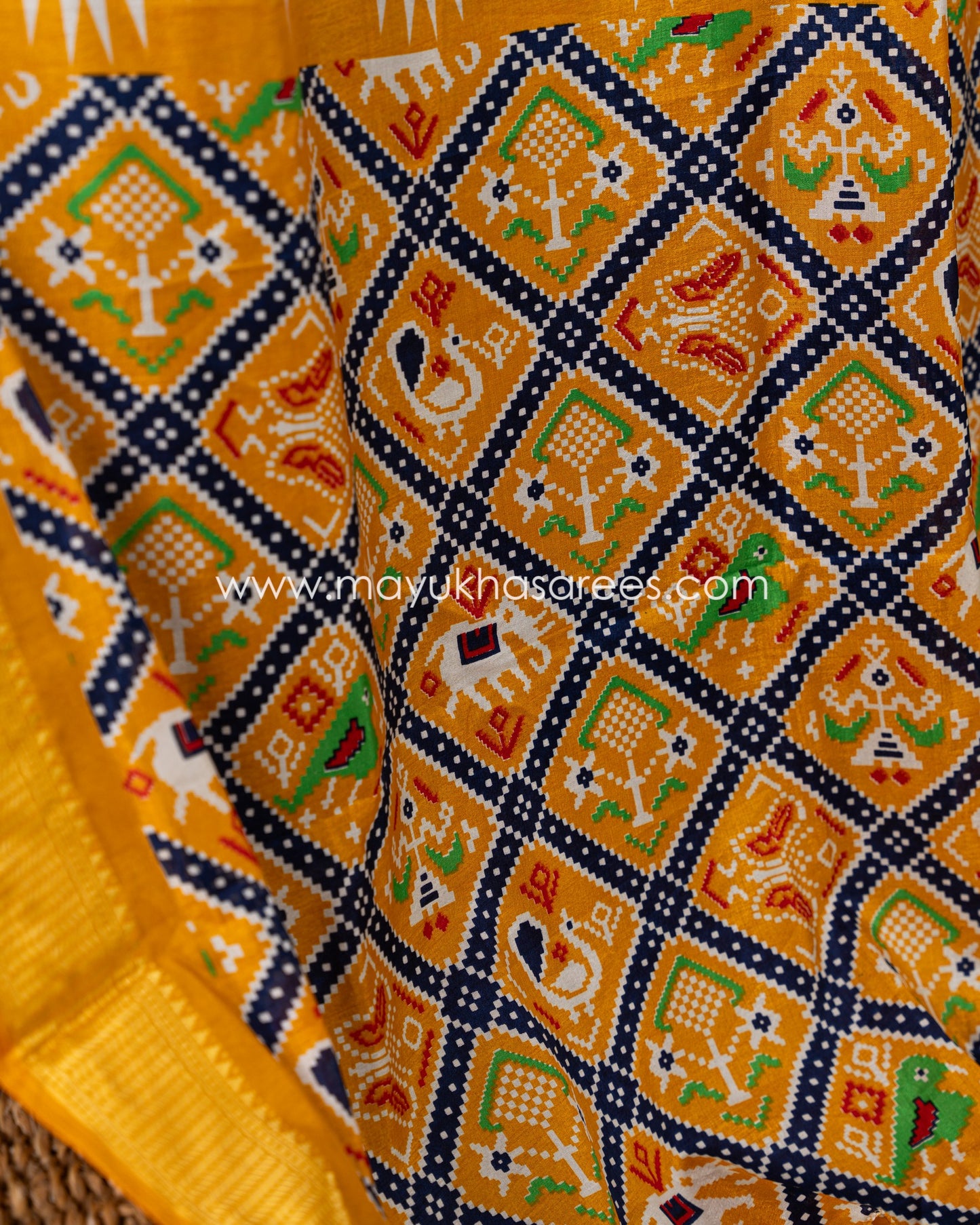 White & Yellow Patola Prints on Munga Silk Saree with Temple Design Borders and Stitched Blouse in Size 38 44