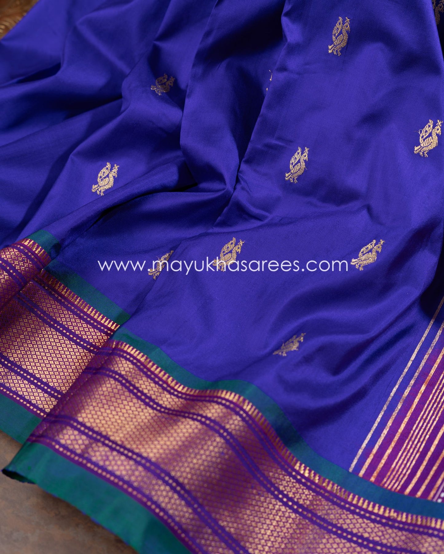 Emerald Peacock Silk Saree With Nauwari Border And Fancy Pallu