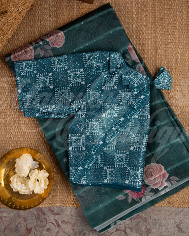 Organza Teal Floral Prints Saree With Dhana Border And Ajrak Blouse With Stitched Blouse In Size 38-44 mayukhasarees